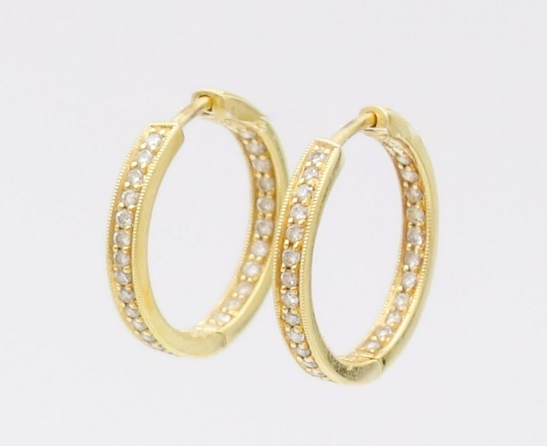 Vintage Simon G 18K Gold Diamond "In and Out" Hoop Earrings: This is a vintage pair of designer Simon G a8K gold "In and Out" hoop earrings with round full cut diamonds. The diamonds are SI-I clarity and H-I color Each has a diameter od 17.7mm. The total weight