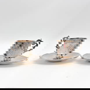 Two antique 19th Century Russian Imperial 84 Silver Cup and Saucer sets: Two antique 19th Century Russian Imperial 84 Silver Cup and Saucer sets Weight: 399.7 g All marked: C.C / MA / 1860 / 84 / [Moscow city mark] Cup: 2.875 x 2.875 x 4 in., Saucer: .75 x 5.25 in.