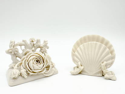 Lot of two Belleek, 1st Black Mark Flowered Menu Holder and 2nd Black Mark Coral Shell Menu Holder: Lot of two Belleek, 1st Black Mark Flowered Menu Holder and 2nd Black Mark Coral Shell Menu Holder 1st Black Mark, 1863 - 1890, 2nd Black Mark, 1891 - 1926 Shell: 2.5 x 2.75 x 2 in., Rose: 2.25 x