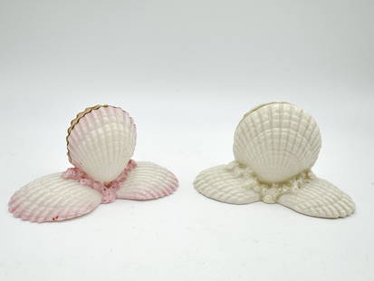 Lot of two Belleek, Shell Menu Holders: Lot of two Belleek, Shell Menu Holders 2nd Black Mark, 1891 - 1926, 3rd Black Mark, 1926 - 1946 Pink: 2 x 3.75 x 1.75 in., White: 2.125 x 3.5 x 1.625 in.