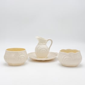 Lot of four Belleek, 1st Green Mark, Toy Shell Two Sugar Bowls, Cream Jug and Saucer