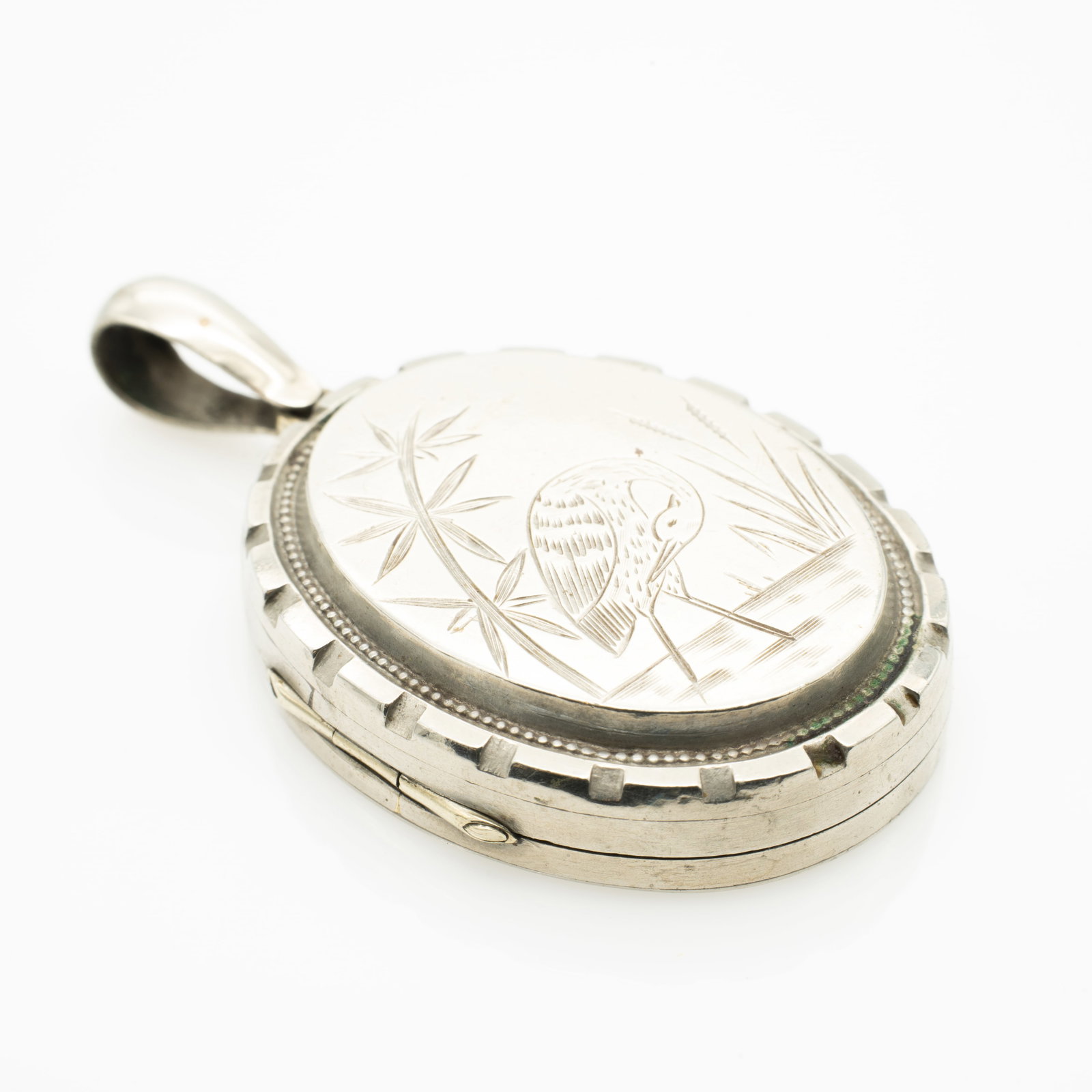 Antique Large Aesthetic Silver Crane In Marsh Picture Locket: Lot 77 Antique Large Aesthetic Silver Crane In Marsh Picture Locket 2.25 x 1.32 x .36 in. 16.5 g