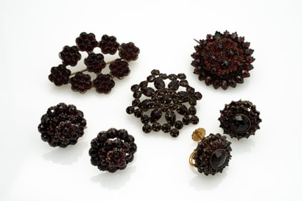 Lot of Seven Garnet Jewelry Pieces incl Brooches and Earrings