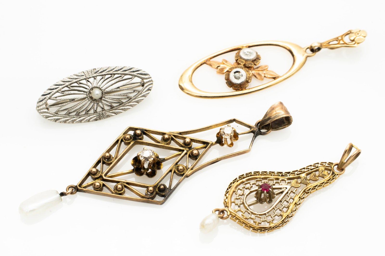 Lot of Gold Victorian Pendants, 14k White Gold, 10k Gold, Diamond, Pearl: Lot 97 Lot of Gold Victorian Pendants, 14k White Gold, 10k Gold, Diamond, Pearl White Gold Stamped: 14K Each Other Stamped: 10K Smallest (14k): .89 x .38 x .26 in. Largest (10K with Diamond and Pearl)