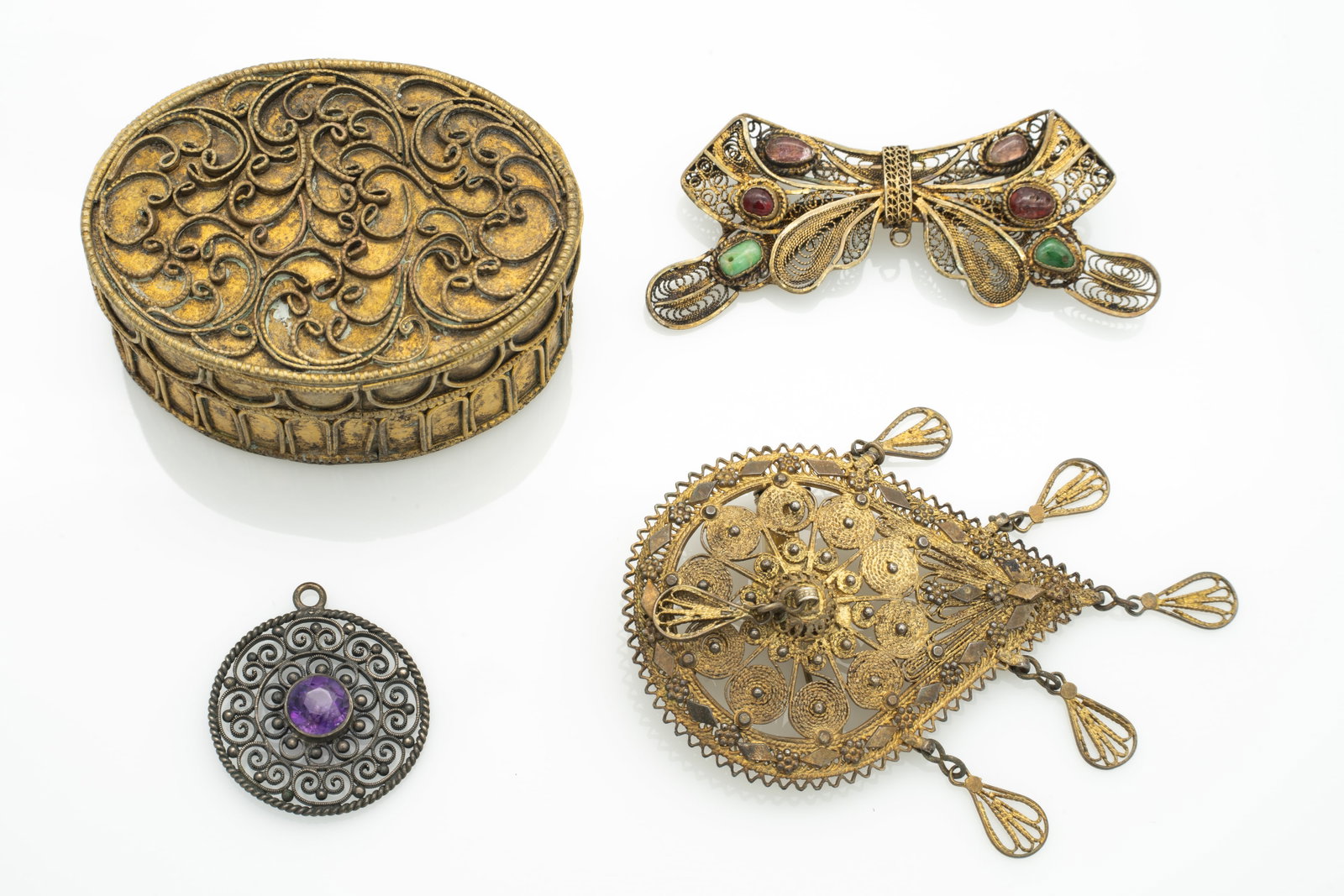 Lot of 4 Filigree Items incl Chinese, Israel Origins, and Box: Lot 108 Lot of 4 Filigree Items incl Chinese, Israel Origins, and Box Larger Brooch Stamped: ISRAEL / 925 , Smaller Brooch Stamped: SILVER Box: 1.1 x 2.22 x 1.6 in. Pendant: 1.09 x .97 x .21 in. 50.3 