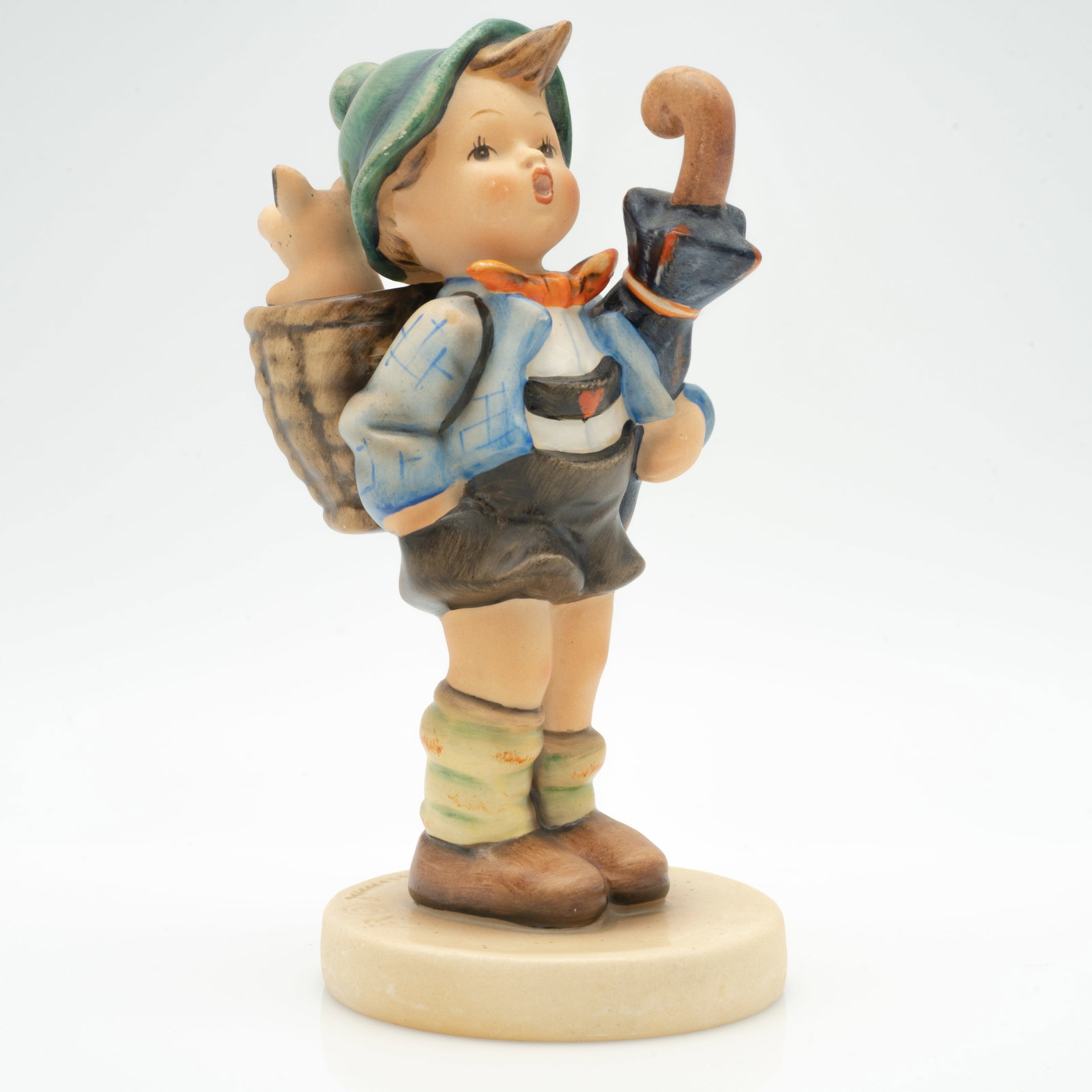 TMK 1 Hummel Figurine, #198 "Home From Market": Lot 125 TMK 1 Hummel Figurine, #198 "Home From Market" 5.7 x 3.5 x 2.7 in.