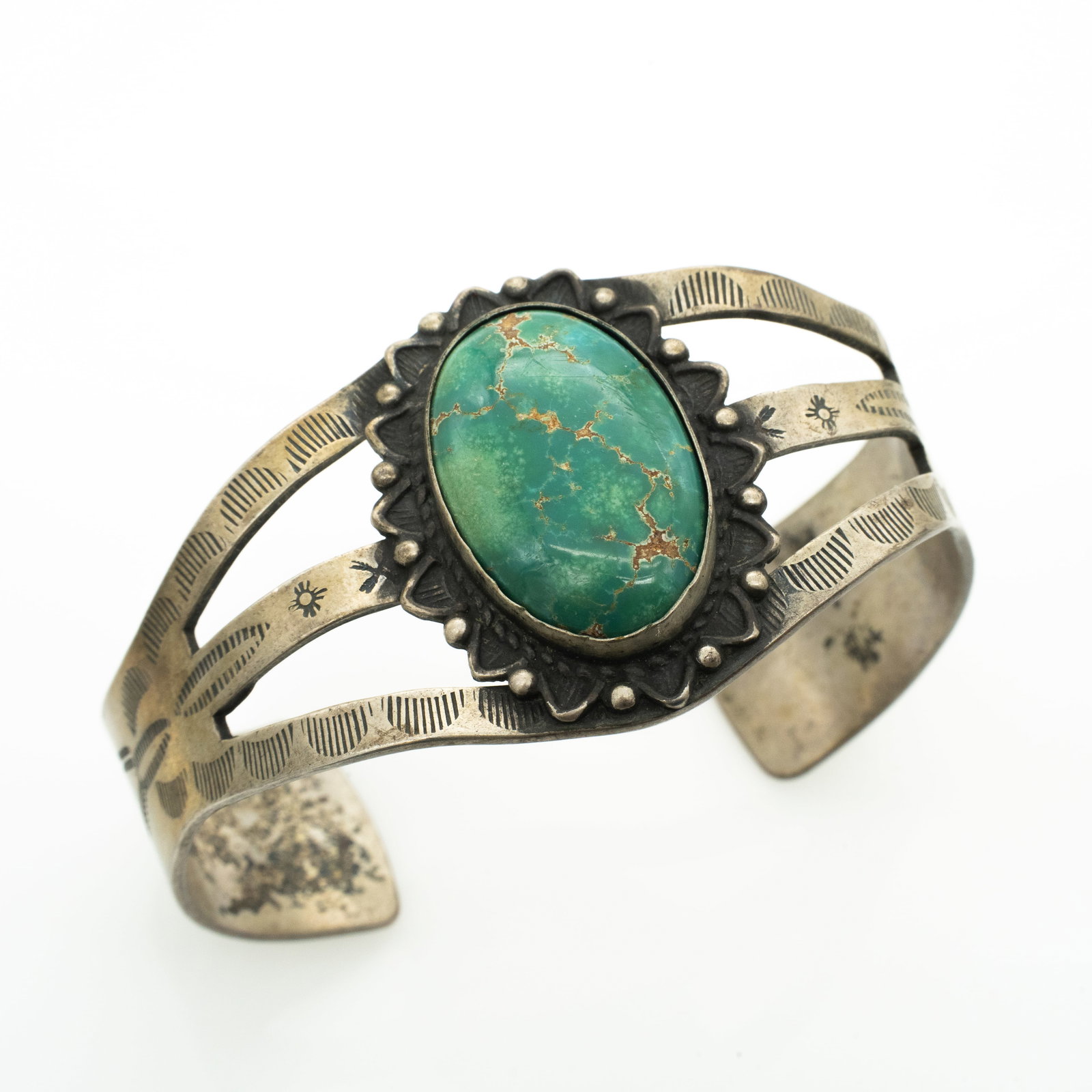 Native American Navajo Sterling Silver Turquoise Bracelet, Pawn: Lot 226 Native American Navajo Sterling Silver Turquoise Bracelet, Pawn Internal Circumference: 6.5 in. Width: 1.34 in. Cabochon: 25.8 x 17.3 mm 35.3 g