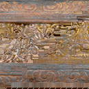 A Tibetan Painted and Carved Wooden Book Cover or Pecha Cover