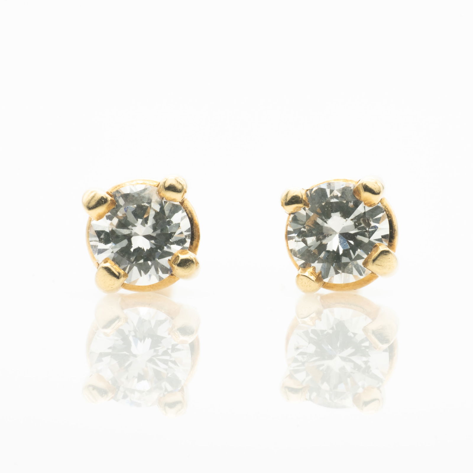 Pair of 14k Gold Diamond Solitaire 1/4 ct Stud Earrings (1 of 3)