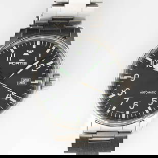 Vintage Fortis Ref 595 Automatic Running Condition Includes Papers: Lot 15 Vintage Fortis Ref 595 Automatic Running Condition Includes Papers Description: Includes papers. Running condition. See Photos for markings. Material: Stainless Steel. Dimensions: Case: