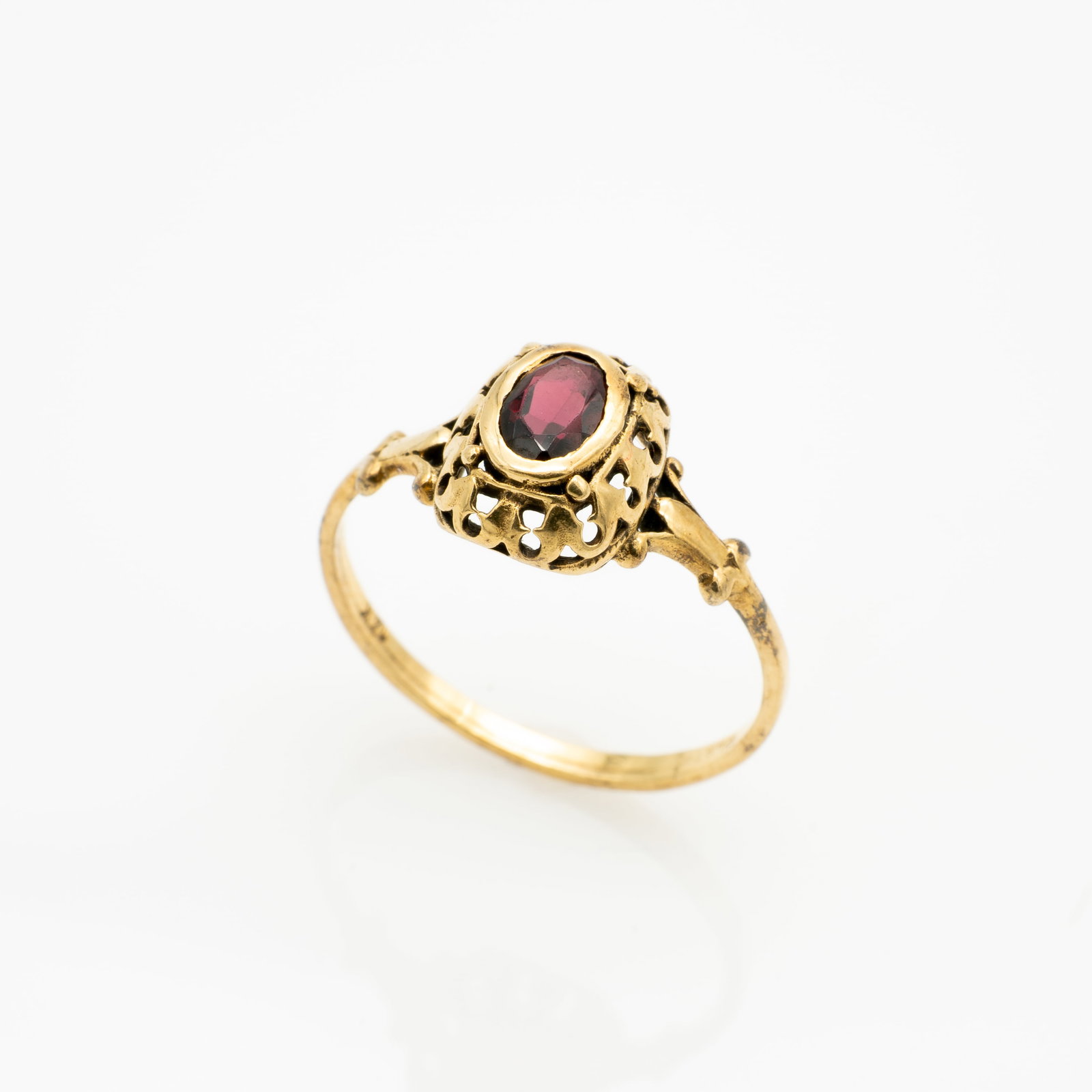Vintage Mid-Century, Ed Levin, 14k Gold and Garnet Ring, Size 6.5: Lot 57 Vintage Mid-Century, Ed Levin, 14k Gold and Garnet Ring, Size 6.5 Description: Stamped: [copyright] LEVIN / 14K Dimensions: Ring Size: 6.5 Width: .38 in. Weight: 1.67 g