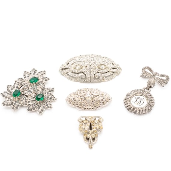 Art Deco Rhinestone Marcasite Jewelry Incl Sterling Silver and Duette: Lot 103 Art Deco Rhinestone Marcasite Jewelry Incl Sterling Silver and Duette Description: LD Bow and Medal Stamped: STERLING / STERLING / Elco Each Matching Shoe Buckle Brooch Stamped: PAT 1852188 Sh