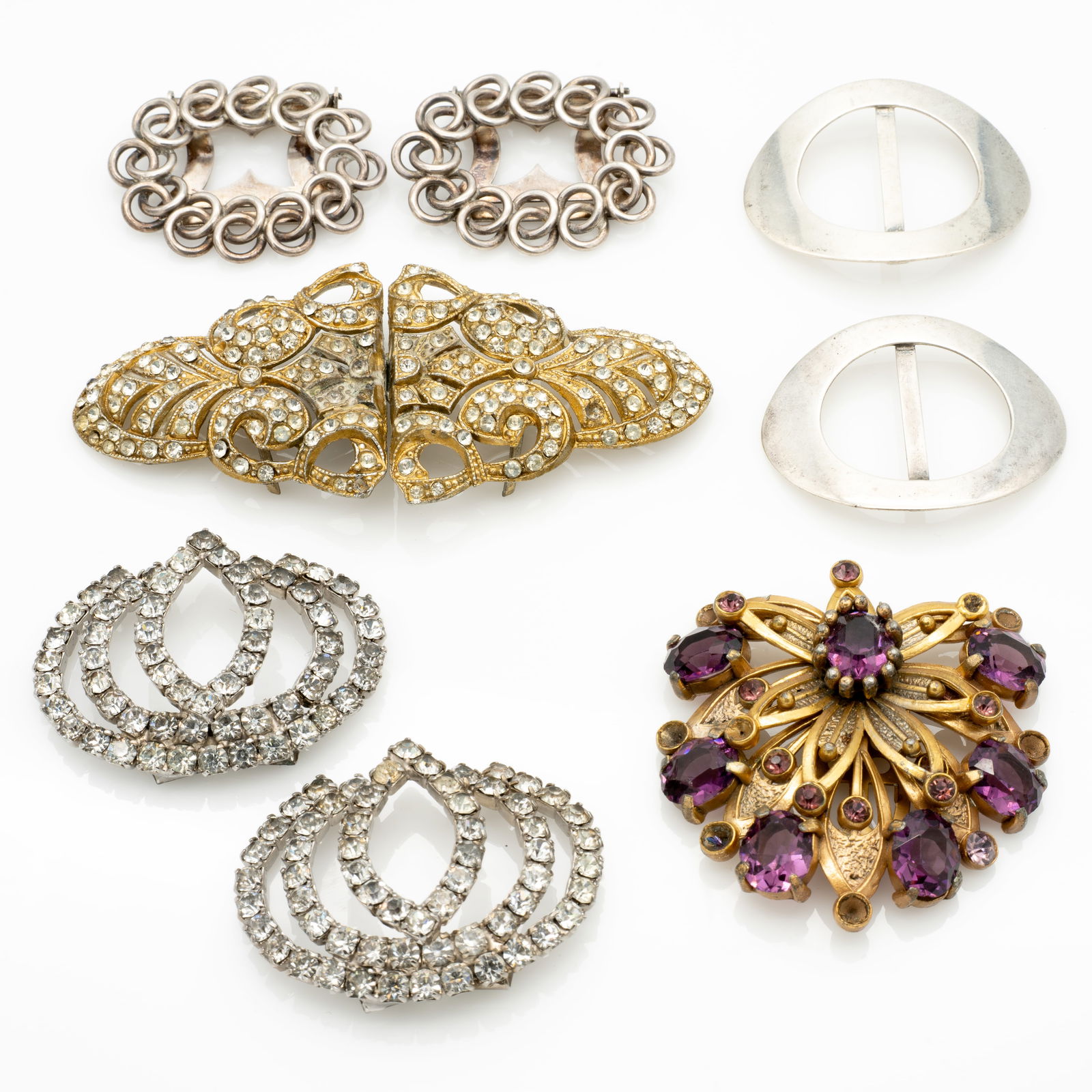 Vintage Antique Art Deco Dress Clips and Buckles Incl Sterling Silver and Rhinestones: Lot 104 Vintage Antique Art Deco Dress Clips and Buckles Incl Sterling Silver and Rhinestones Description: Purple Clip Unmarked Matching Rhinestone Pieces Marked: [copyright] MUSI Rhinestone Belt Buck