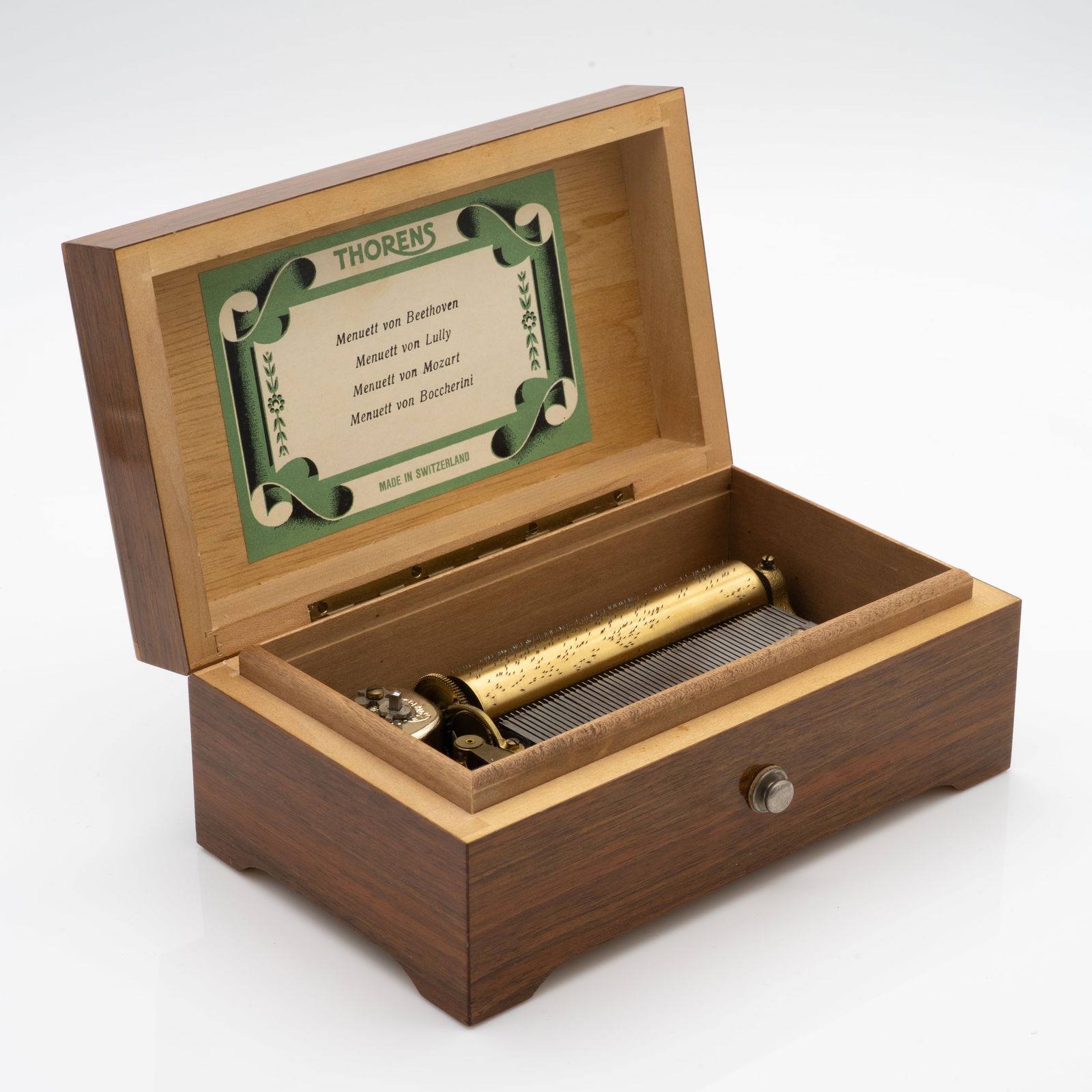 Vintage Thorens Four Tune Inlay Music Box: Lot 112 Vintage Thorens Four Tune Inlay Music Box Description: Please reach out via email to request a video of the box running. Dimensions: 2.8 x 6.63 x 4 in. Weight: 691 g