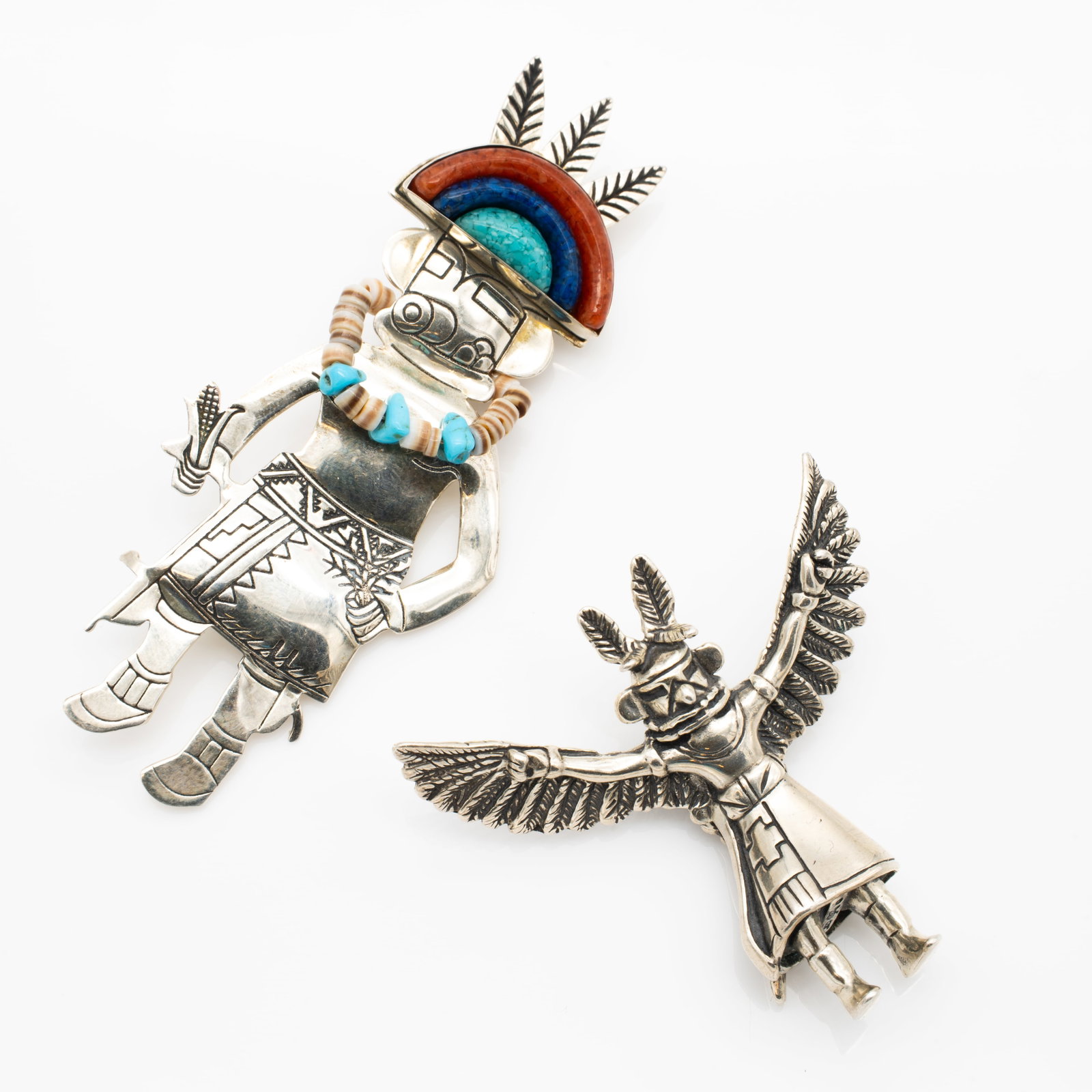 2 Caroline Pollock Kachina Figures Pendant Brooches Sterling Silver Turquoise Coral: Lot 163 2 Caroline Pollock Kachina Figures Pendant Brooches Sterling Silver Turquoise Coral Description: Larger Stamped: STER. CP [copyright] Smaller Stamped: .925 CP [copyright] Dimensions: Larger