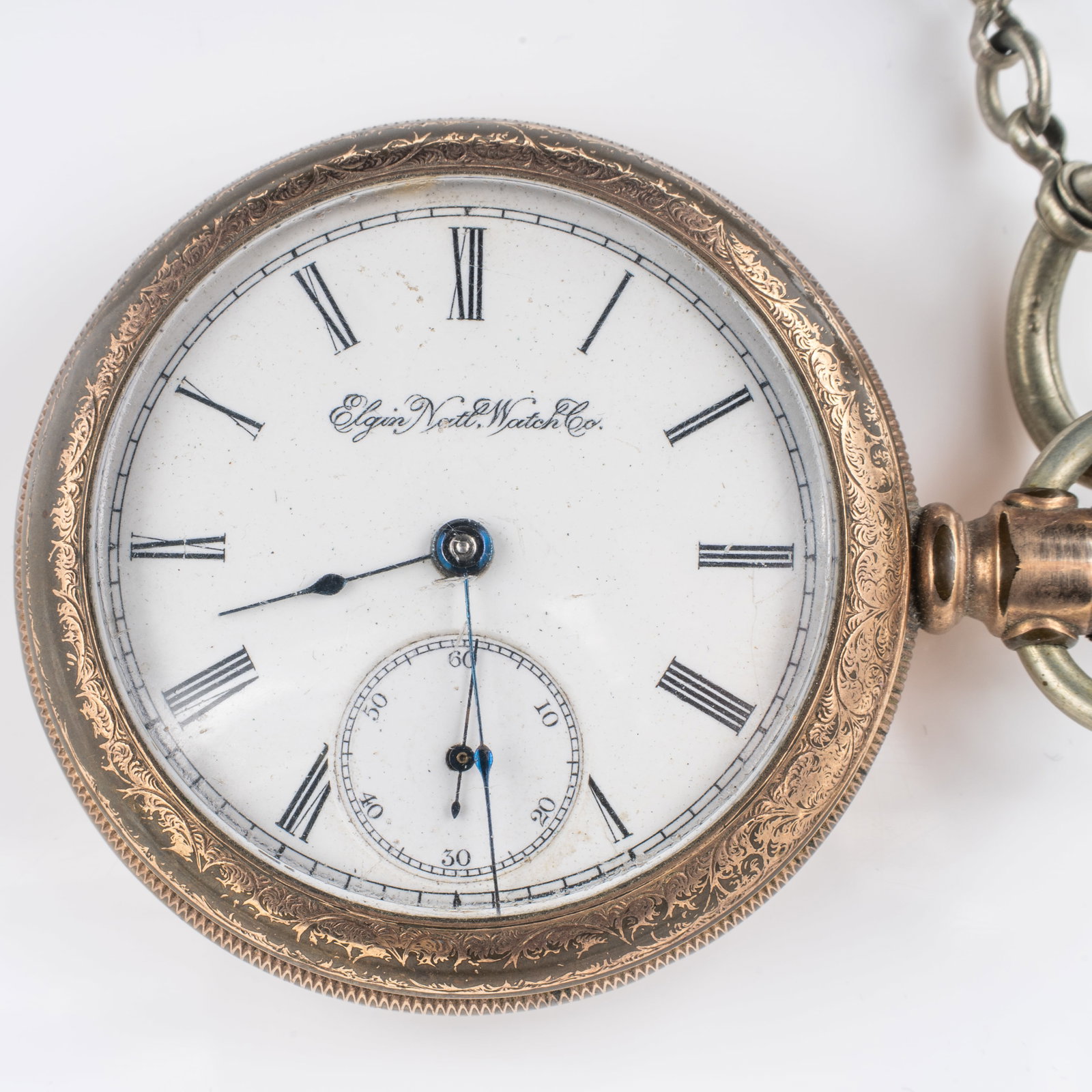 19th Century Elgin GM Wheeler Gold GF Pocket Watch incl Nickel Silver Watch Chain: Lot 256 19th Century Elgin GM Wheeler Gold GF Pocket Watch incl Nickel Silver Watch Chain Description: Watch Face Marked: Elgin Natl. Watch Co. Dimensions: 81 x 54.8 x 19.5 mm Chain Length: 17 in.