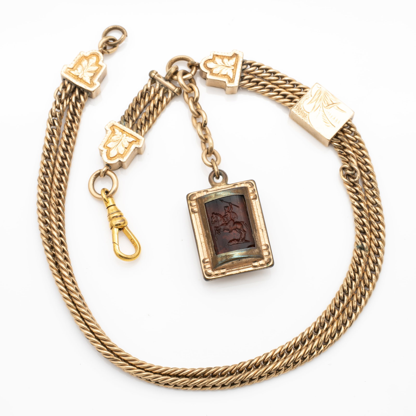 Antique Ornate Heavy Gold GF Watch Chain incl Warrior with Spear Fob: Lot 273 Antique Ornate Heavy Gold GF Watch Chain incl Warrior with Spear Fob Dimensions: Total Length: 13.13 in. Fob: 1.18 x .75 x .37 in. Weight: 48.2 g