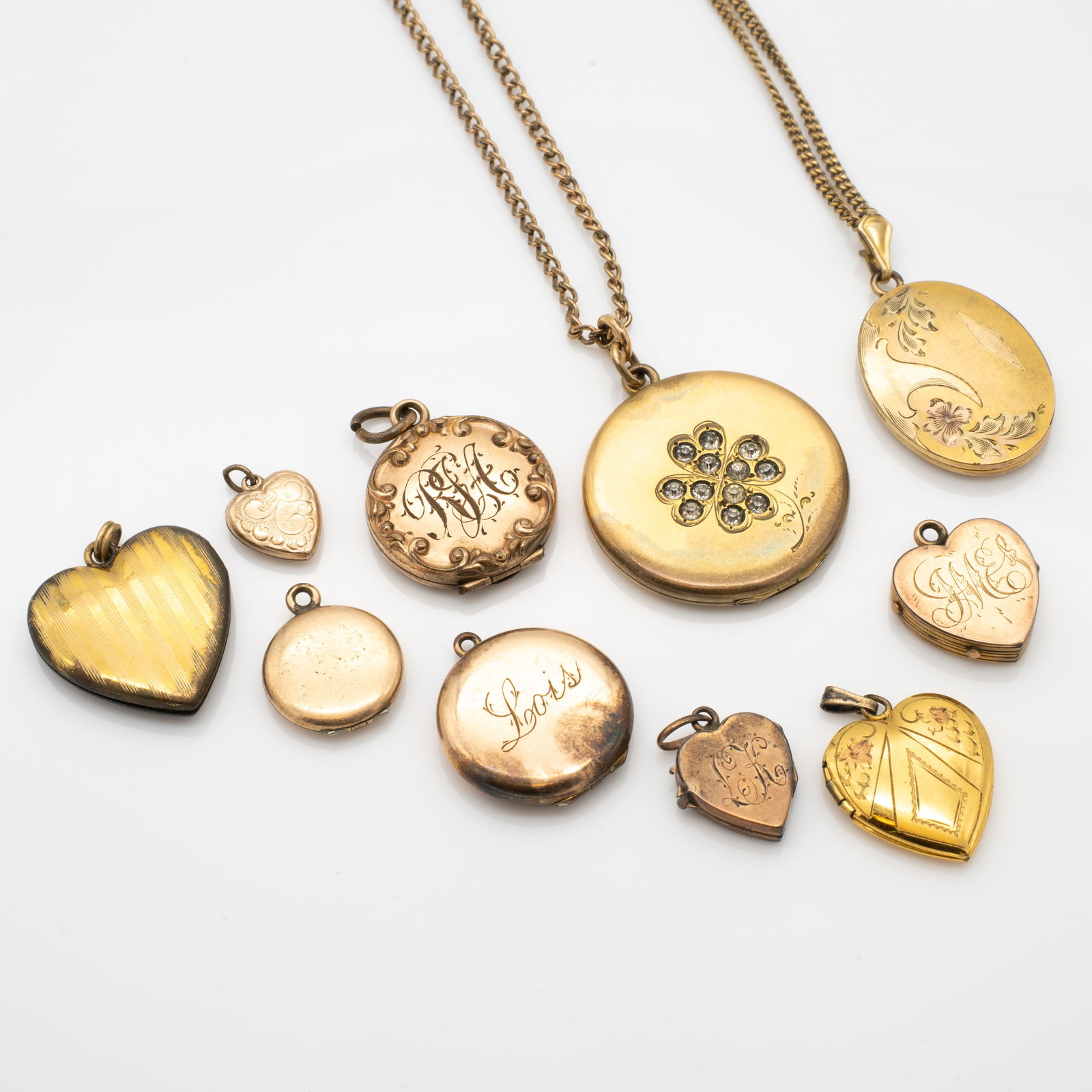 Group of 10 Antique Victorian Gold GF Lockets: Lot 282 Group of 10 Antique Victorian Gold GF Lockets Description: The smallest does not open. Dimensions: Smallest: .48 x .42 x .14 in. Largest: 1.33 x 1.18 x .18 in. Weight: 52.1 g