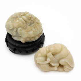 Group of Two Chinese Celadon Hardstone Carvings: Monk with Mythical Beast and Intertwined Beasts