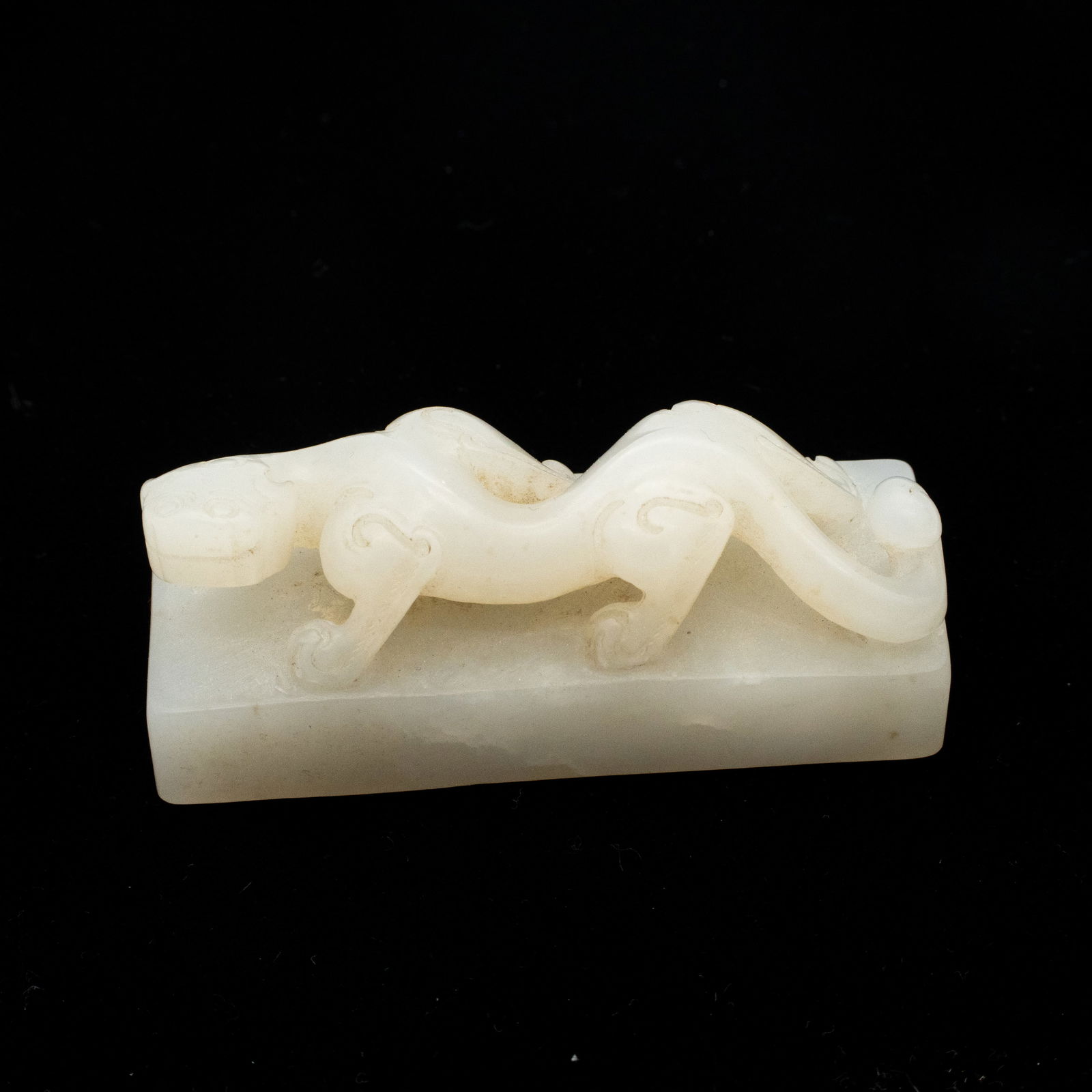 Carved Chinese White Jade Toggle of a Chilong of plinth (1 of 8)