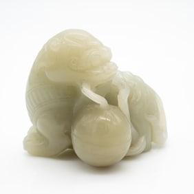 Carved Chinese Nepherite Jade Figure of a Foo Lion with Ball