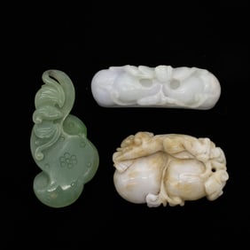 Lot of Three Chinese Jade Pendants: Bat with Gourds, Fungus with Bat, and Cat with Peaches