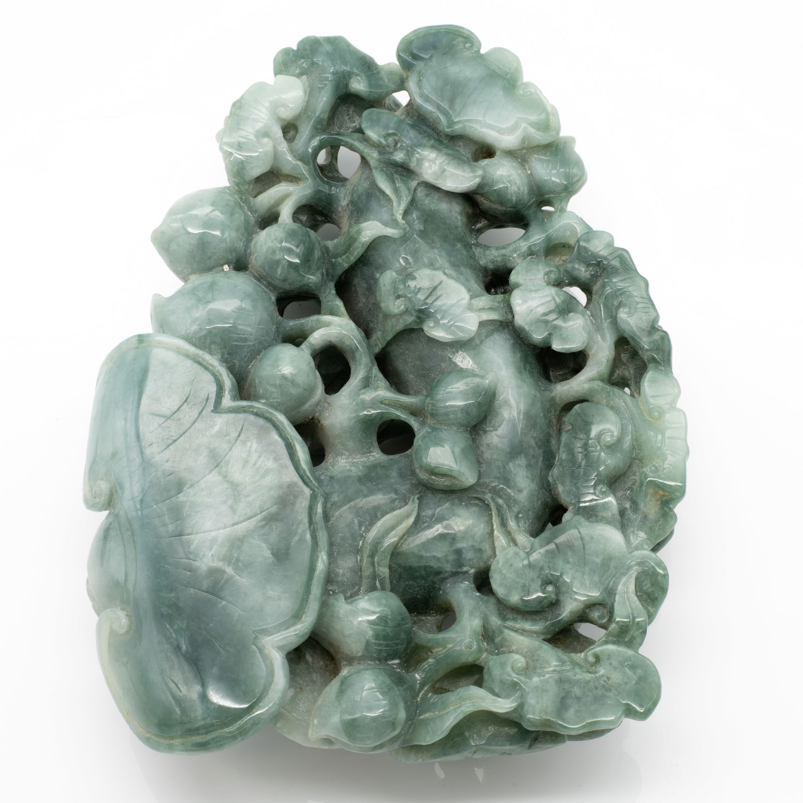 Substantial Carved Chinese Jade Lingzhi Mushroom Plaque: Lot 88 Substantial Carved Chinese Jade Lingzhi Mushroom Plaque Description: The plaque is rendered in celadon Jade with soft bluish undertones and semi-translucent areas. Deeply carved in openwork wit