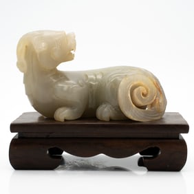 Carved Chinese Celadon Jade Seated Mythical Beast with Coiled Tails