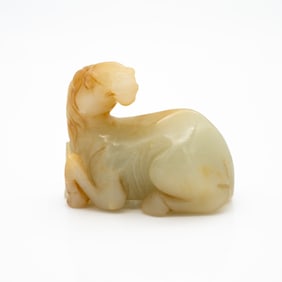 Carved Chinese Jade Figure of a Recumbent Horse with Raised Head