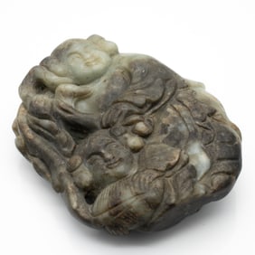 Carved Chinese Jade Plaque of Two Children Beneath a Lotus Leaf