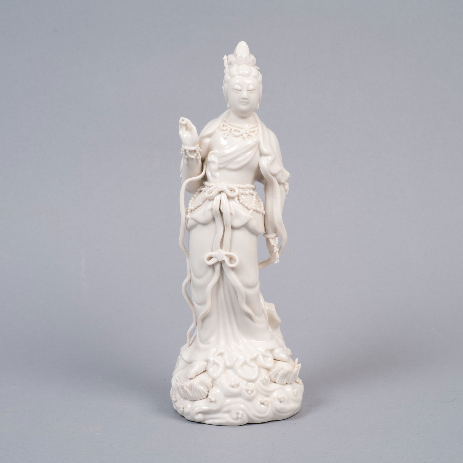 Chinese, Blanc de Chine Porcelain Guanyin Figure: Lot 141 Chinese, Blanc de Chine Porcelain Guanyin Figure Description: A detailed blanc de Chine (white porcelain) standing figure of Guanyin, the bodhisattva of compassion. The figure is portrayed in