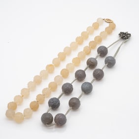 Two Carved Chinese Jade Bead Necklaces with Longevity Symbols