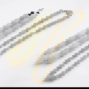 Pair of Chinese Light Green Jade Bead Necklaces, incl 14K Gold: Lot 191 Pair of Chinese Light Green Jade Bead Necklaces, incl 14K Gold Description: A pair of jade necklaces featuring graduated light green beads with polished finishes and subtle natural mottling. T
