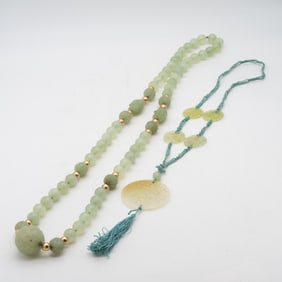 Two Carved Chinese Green Translucent Hardstone Necklaces