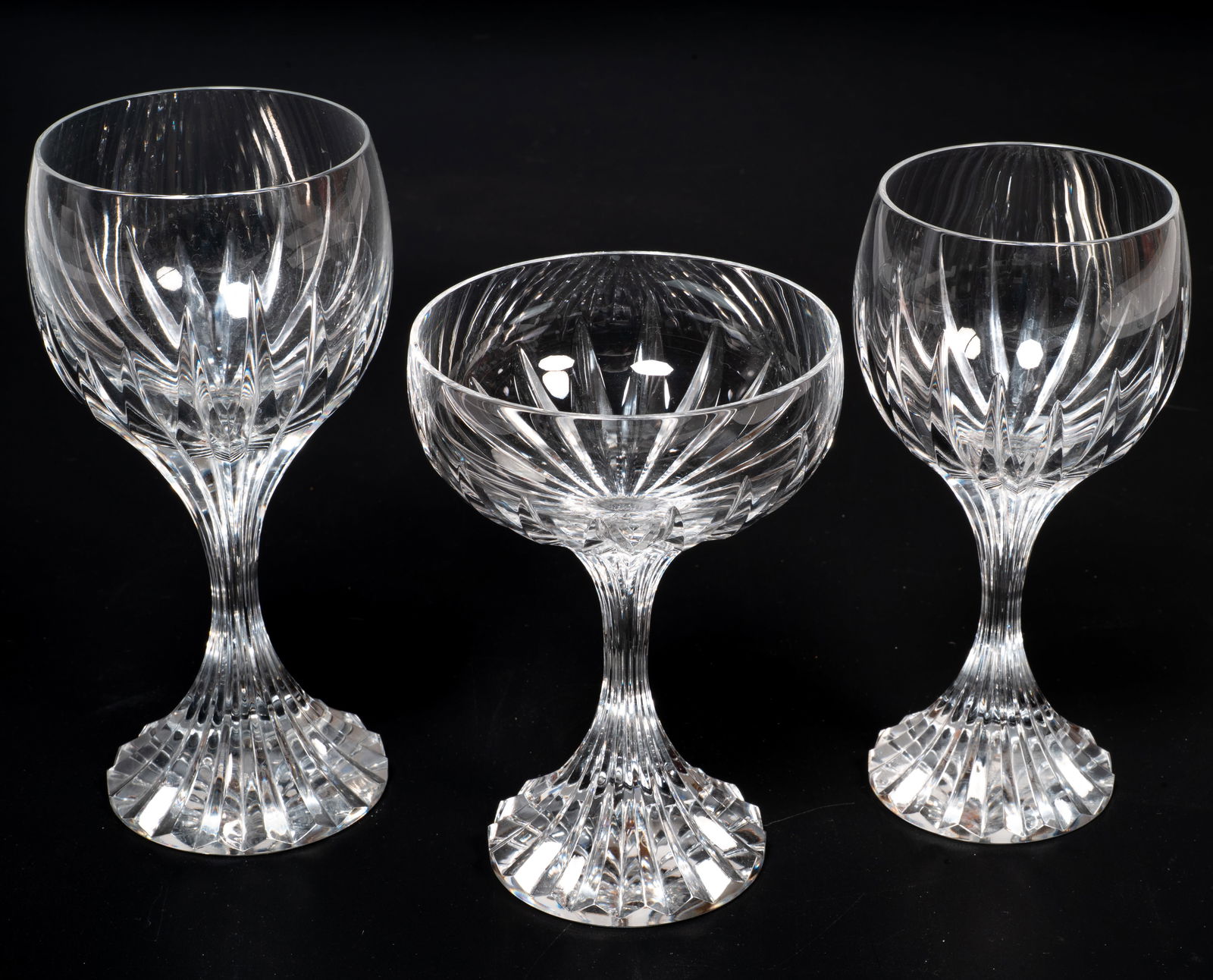 17 Pcs, Baccarat Massena Cut Crystal Stemware Group: Lot 292A 17 Pcs, Baccarat Massena Cut Crystal Stemware Group Description: Group of Baccarat crystal stemware in the Massena pattern, featuring deeply fluted vertical cuts that radiate from the stem an