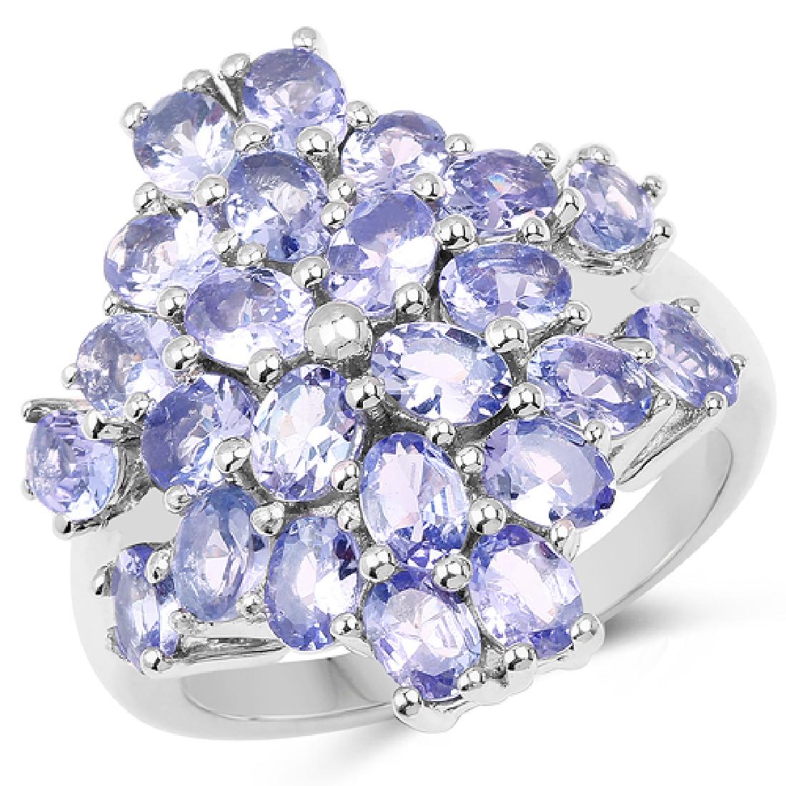 4.08 CTW Genuine Tanzanite .925 Sterling Silver Ring: 4.08 CTW Genuine Tanzanite .925 Sterling Silver Ring Metal Type: .925 Sterling Silver Setting: Prong Item: Ring Finish: Rhodium Plated Total CTW: 4.08 Carat Length 21.41 MM Width: