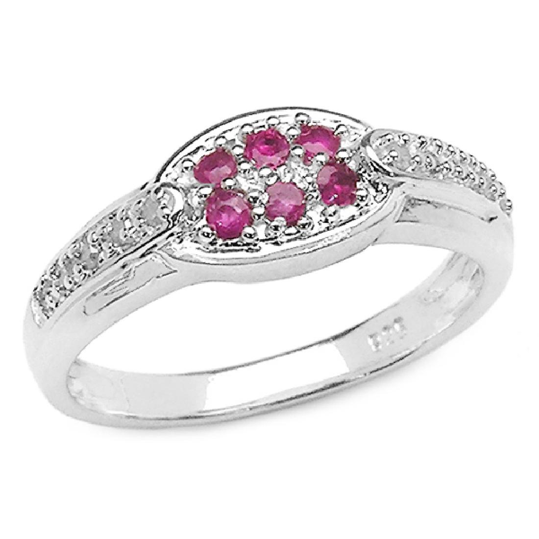 0.33 CTW Genuine Ruby .925 Sterling Silver Ring: 0.33 CTW Genuine Ruby .925 Sterling Silver Ring Metal Type: .925 Sterling Silver Setting:channel Item:Ring Finish:Rhodium Plated Total CTW:0.33 Carat Product Weight: 2.30 Grams Gemstone T