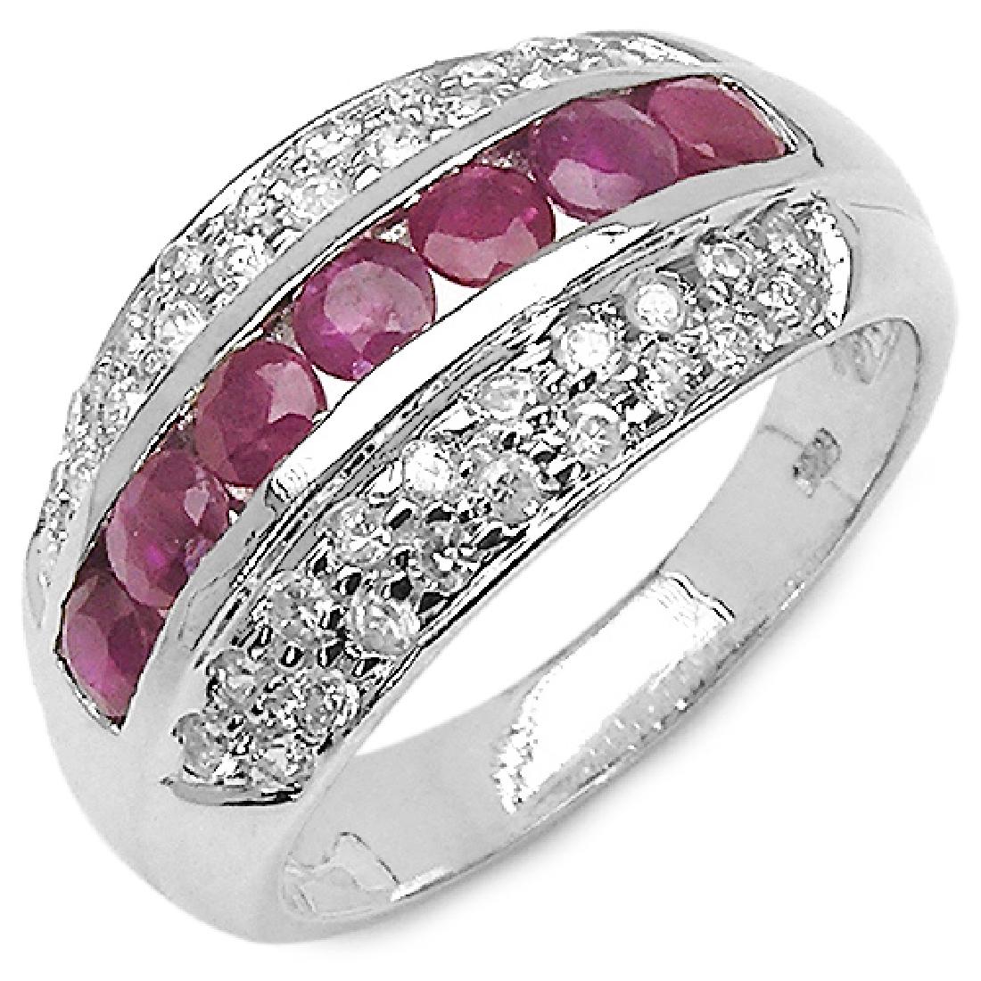 1.36 CTW Genuine Ruby .925 Sterling Silver Ring: 1.36 CTW Genuine Ruby .925 Sterling Silver Ring Metal Type: .925 Sterling Silver Setting: Prong-Set Item:Ring Finish:Rhodium Plated Total CTW:1.36 Carat Product Weight: 3.44 Grams Gemston