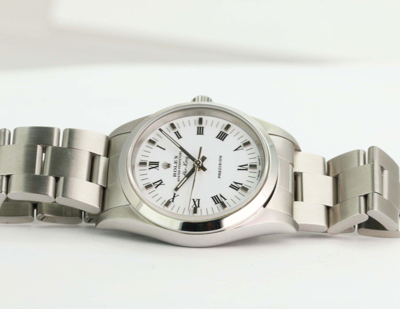 Pre-Owned Rolex Oyster Perpetual Air-King Precision: Excellent Pre-Owned Rolex Oyster Perpetual Air-King Precision 14000 Condition: Excellent Pre-owned Authentic Packaging: Comes with generic watch box Paperwork: Comes with In-house Certificate Subject