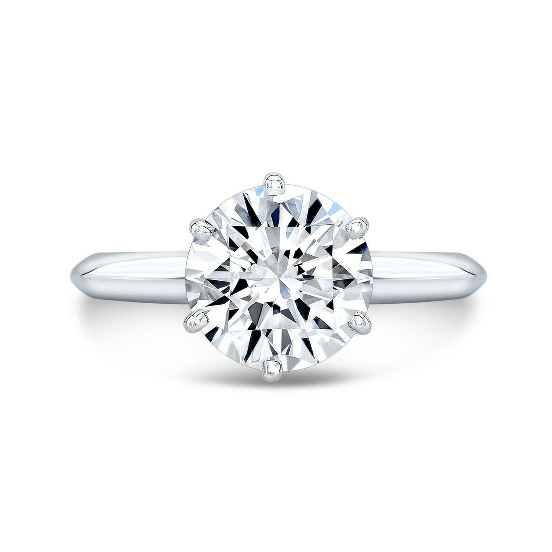 Natural 1.22 CTW Round Cut Diamond Knife Edge Solitaire: Natural 1.22 CTW Round Cut Diamond Knife Edge Solitaire Ring 14KT White Gold Manufacturer's Suggested Retail Price: $ 24000.00 Center Stone Type: Diamond Center Stone QTY: 1 Center Stone CTW: 1.22 Cen
