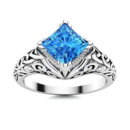 Natural 1.35 CTW Topaz Solitaire Ring 18K White Gold: Natural 1.35 CTW Topaz Solitaire Ring 18K White Gold Manufacturer's Suggested Retail Price: $2130.00 Center Stone: 1 Topaz @ 1.35 ctw Center Stone Color: Blue Center Stone Clarity: AAAA Center Stone S