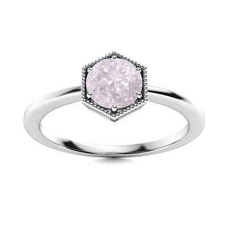 Natural 0.42 CTW Rose Quartz Solitaire Ring 18K White: Natural 0.42 CTW Rose Quartz Solitaire Ring 18K White Gold Manufacturer's Suggested Retail Price: $1380.00 Center Stone: 1 Rose Quartz @ 0.42 ctw Center Stone Color: Pink Center Stone Clarity: AAAA Ce
