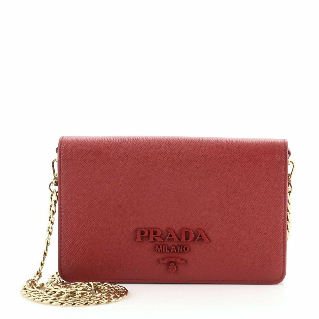 Prada Chain Wallet Crossbody Saffiano Leather: Prada Chain Wallet Crossbody Saffiano Leather Condition: Pre-owned: An item that has been used or worn previously. . Brand: Prada Color: Red Material: Leather Department: Women Style: Cross body bags