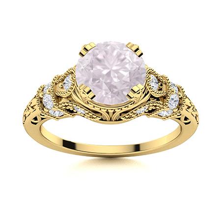 Natural 1.06 CTW Rose Quartz & Diamond Engagement Ring: Natural 1.06 CTW Rose Quartz & Diamond Engagement Ring 18K Yellow Gold Manufacturer's Suggested Retail Price: $3270.00 Center Stone: 1 Rose Quartz @ 0.72 ctw Center Stone Color: Pink Center Stone Clar