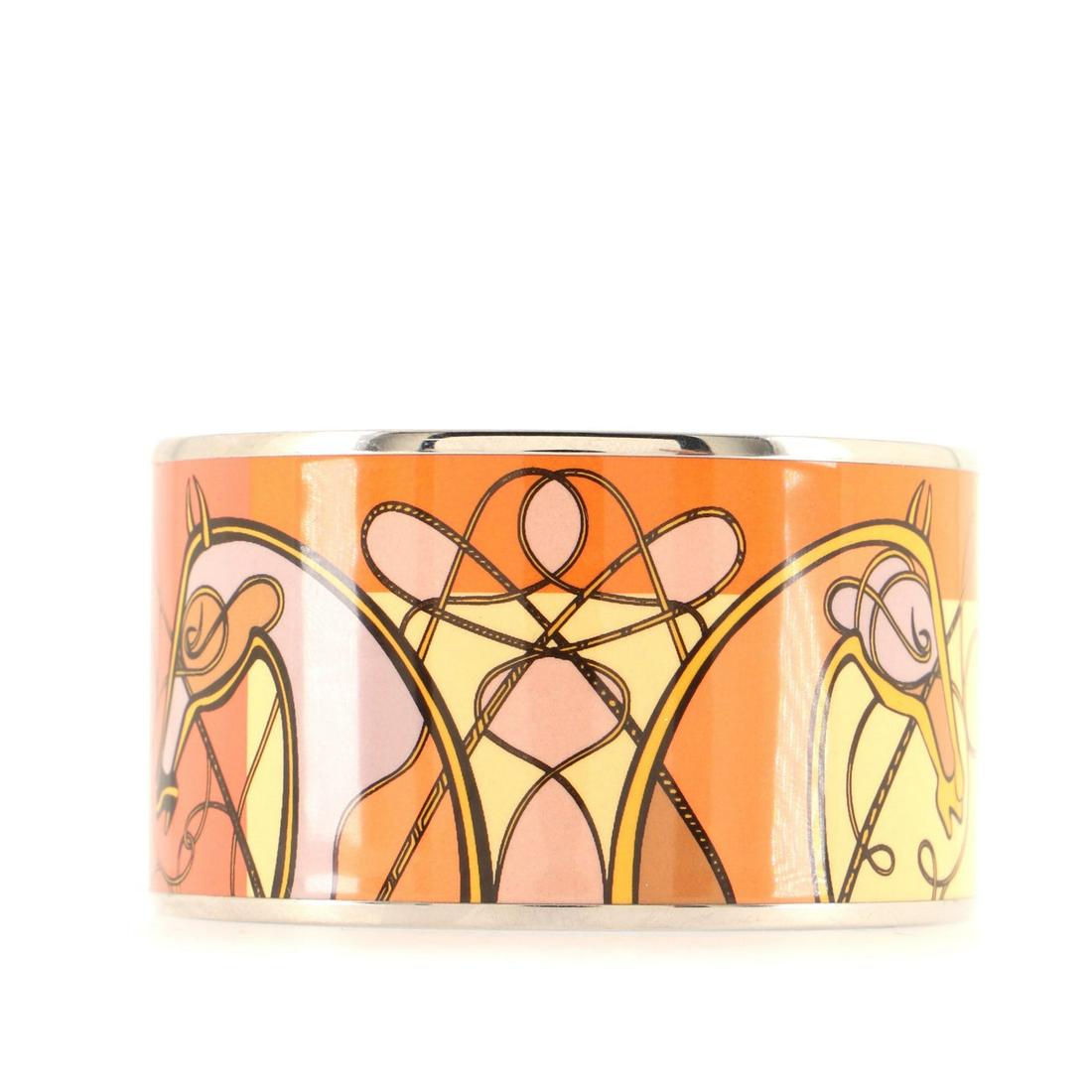 Hermes Bangle Bracelet Printed Enamel Extra Wide: Hermes Bangle Bracelet Printed Enamel Extra Wide Brand: Hermes Exterior Color: Print, Silver Material: Enamel, Palladium REF CODE: BT.HM.BAGL.EEEL.EXWI Item No: 103810/7 SIZE AND FIT: Ci