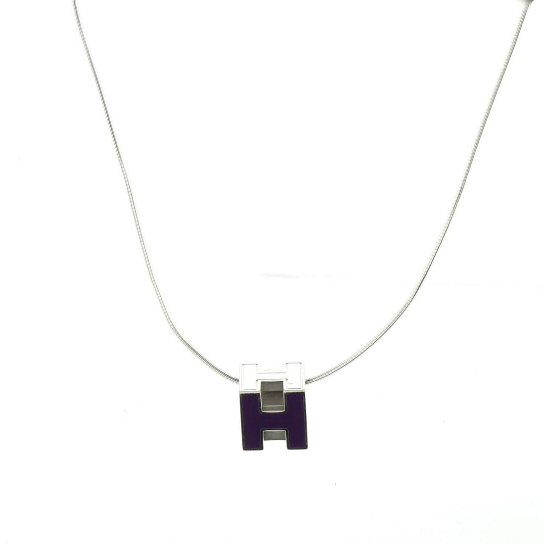 Hermes Cage d'H Pendant Necklace Metal with Enamel: Hermes Cage d'H Pendant Necklace Metal with Enamel Exterior Color: Purple, Silver Material: Enamel, Metal RBJ no: NL.HM.CUPD.MLWE Item No: 112387/1 SIZE AND FIT: Length: 17.00 ", Width: 11 mm <br