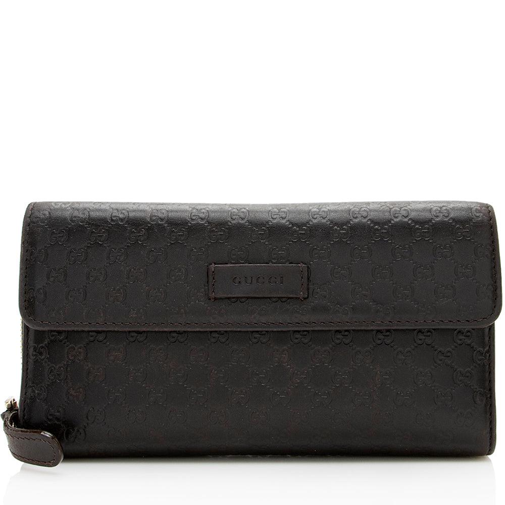 Gucci Microguccissima Continental Flap Wallet: Gucci Microguccissima Continental Flap Wallet Condition Quality: Fair Color: Brown Height: 5 in. Length: 7.5 in. Material: Leather Width: 1 in. Item Condition: Pre Owned SKU: RB