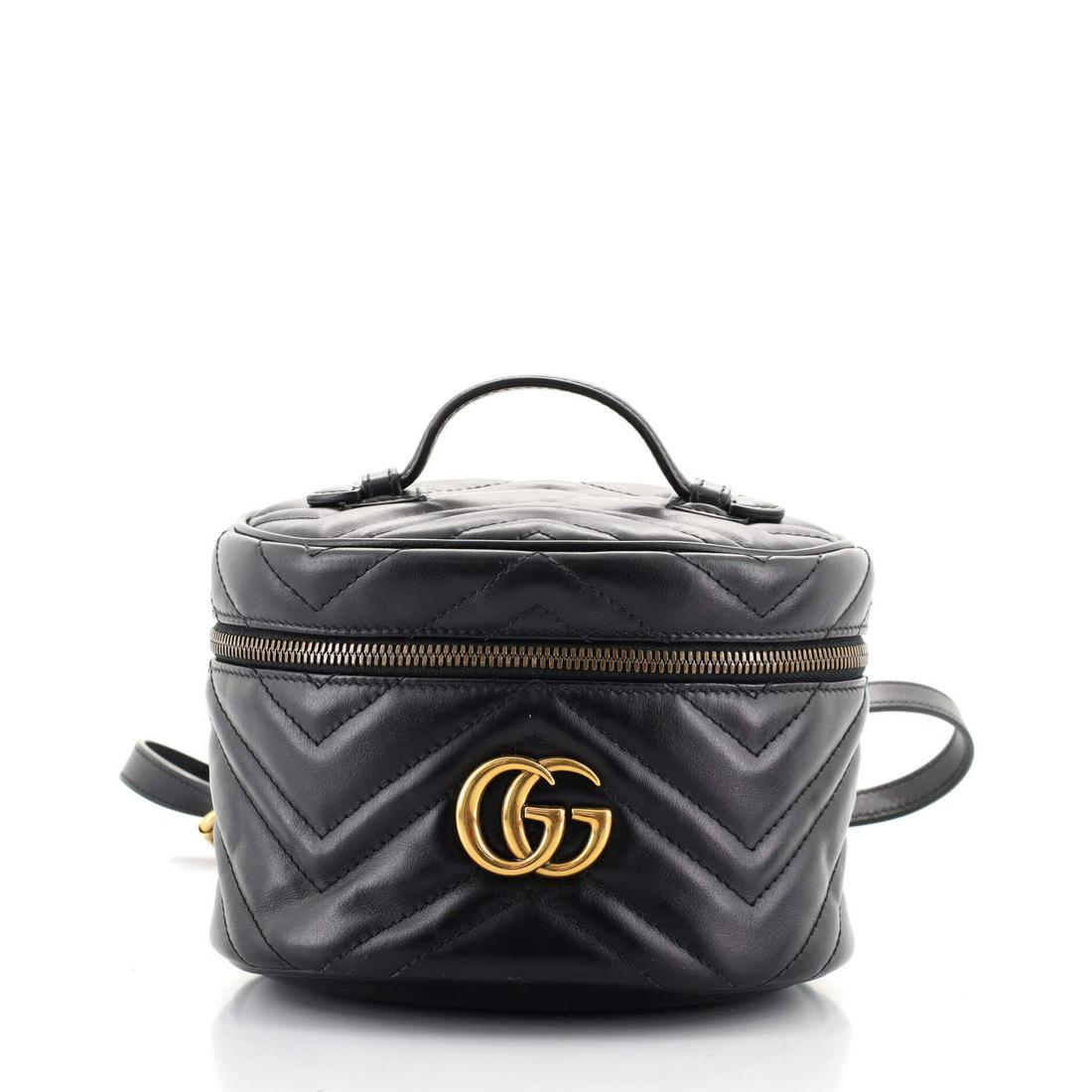 Gucci GG Marmont Vanity Backpack Matelasse Leather Mini: Gucci GG Marmont Vanity Backpack Matelasse Leather Mini Exterior Color: Black Interior Color: Neutral Exterior Material: Leather Interior Material: Microfiber Hardware Color: Gold Accessories: Dus