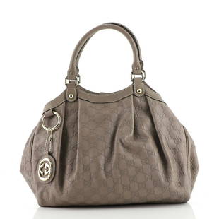 Gucci Sukey Tote Guccissima Leather Medium: Gucci Sukey Tote Guccissima Leather Medium Exterior Color: Neutral Interior Color: Black Exterior Material: Leather Interior Material: Fabric Hardware Color: Gold Tone Accessories: