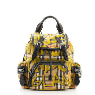 Burberry Graffiti Rucksack Backpack Vintage Check Canvas Small: Burberry Graffiti Rucksack Backpack Vintage Check Canvas Small Exterior Color: Print Interior Color: Black Exterior Material: Nylon Interior Material: Fabric Hardware Color: Silver